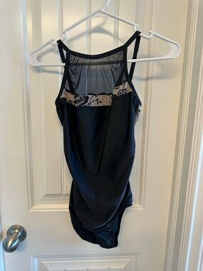 Women’s Black Leotard with Beige Floral Mesh detail. Adult medium